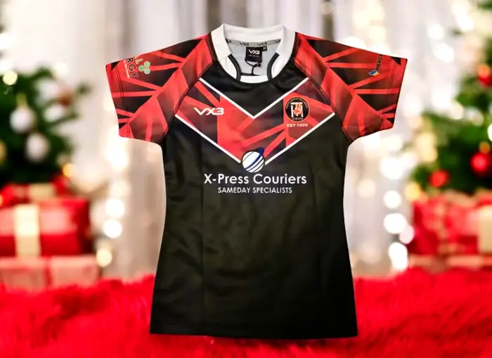 Thatto Heath U9s rugby shirt with the X-Press Couriers sponsor logo