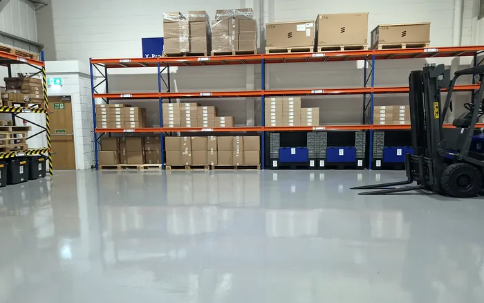 Pallet racking stocked with customer goods in the X-Press Couriers warehouse in St Helens